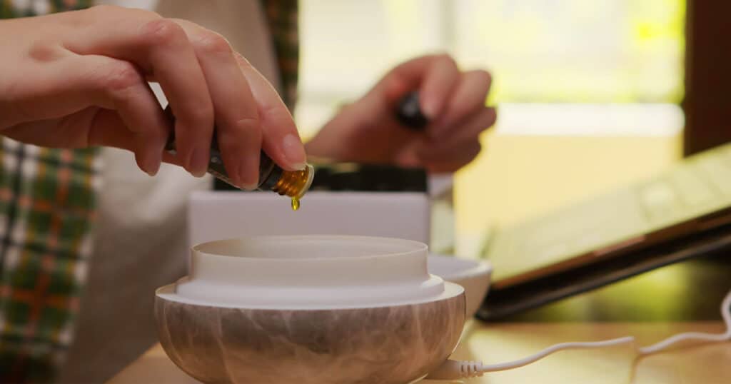 5 Best Smelling Essential Oils for Home 22 using-carrier-oil-with-essential-oil-in-diffuser