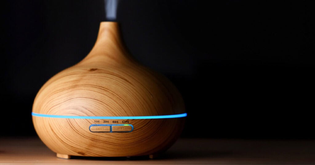 diffuser-in-a-table-with-a-dark-background