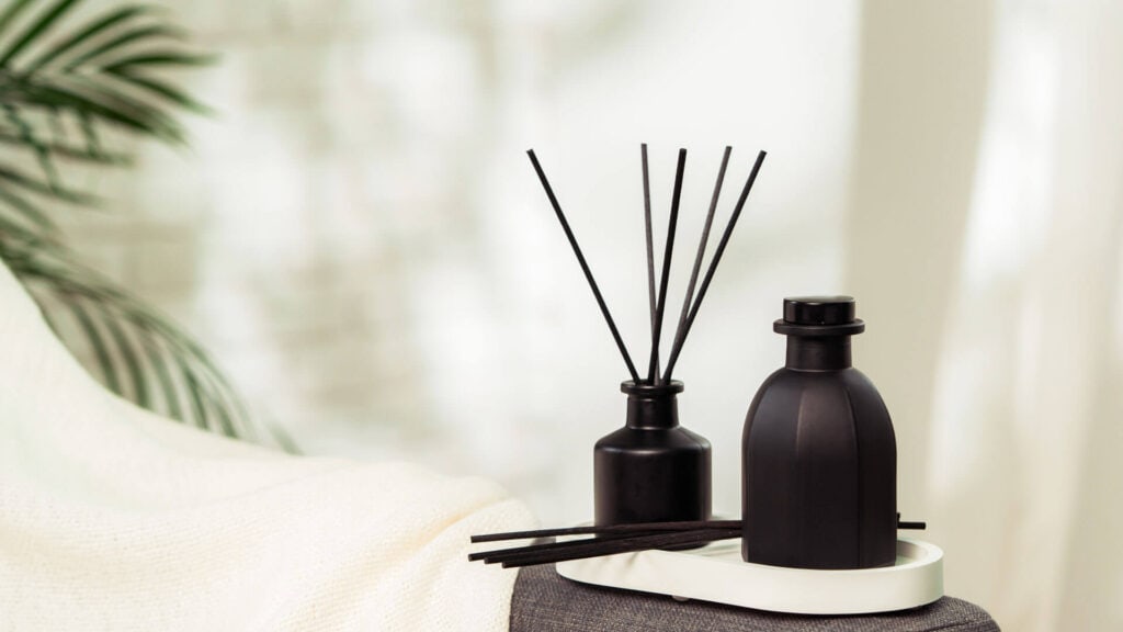 Best Home Aroma 27 black reed diffuser and black bottle of essential oil