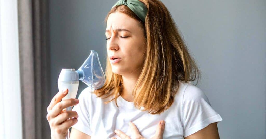 Are Essential Oils Safe for Your Lungs? VOCs and GC/MS Tested Brands 13 lady using nebulizer for her asthma