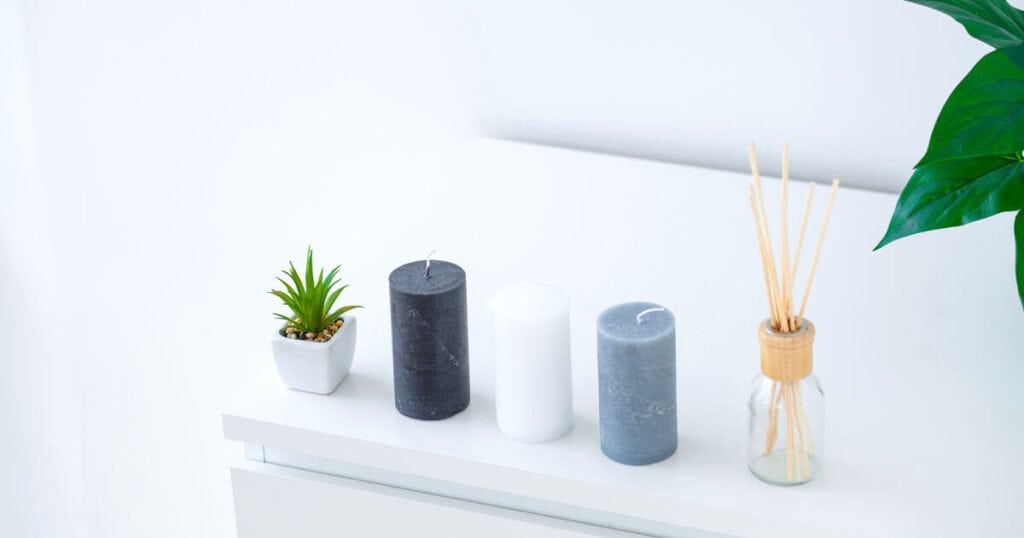 The 10 Healthiest Ways to Fragrance Your Home: A 2026 Guide 10 candles and reed diffuser in a table
