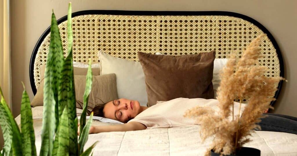 The 10 Healthiest Ways to Fragrance Your Home: A 2026 Guide 31 lady sleeping in her bedroom after work