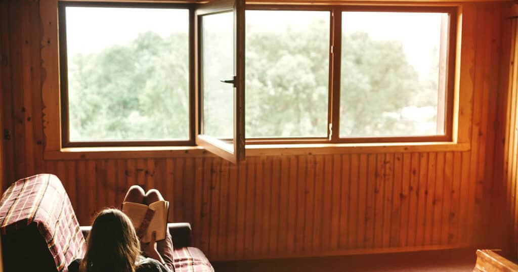 The 10 Healthiest Ways to Fragrance Your Home: A 2026 Guide 11 wooden wall with open window